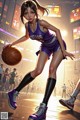 A woman in a purple uniform holding a basketball on a court.